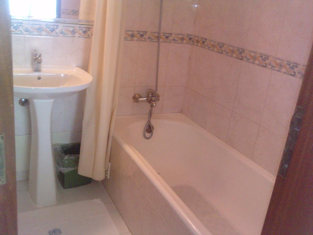 Residencial Nosso Paraiso Panzió Quarteira Szoba fotó